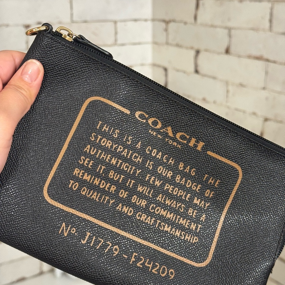 Coach Black Leather Wallet with Gold Accents